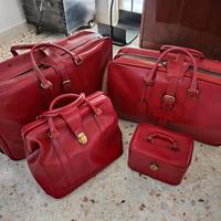 Set di valigie cuoio rosso anni 60