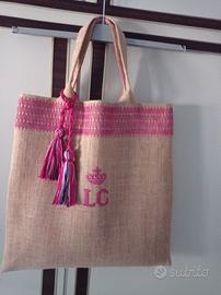 Borsa artigianale in juta ricamata