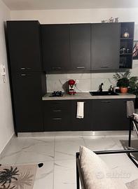 Bilocale arredato con box