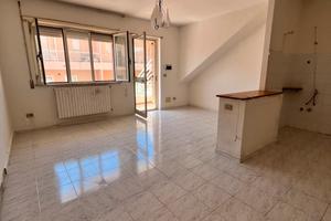 Bilocale con giardino privato e taverna collegata