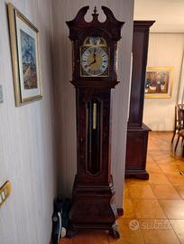 orologio a pendolo a colonna il legno pregiato