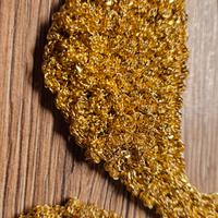 Parure dorata nuova: collana, braccialetto, orecch