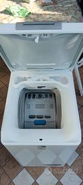 Lavatrice carica dall'alto 7kg.