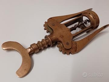 VECCHIO ANTICO CAVATAPPI IN OTTONE 