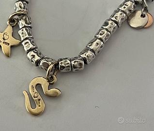 Ciondolo serpente “tu mi tenti” DoDo oro 18 carati