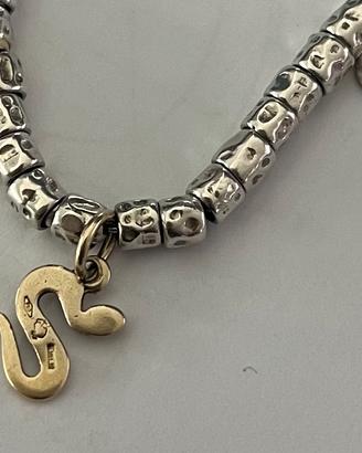 Ciondolo serpente “tu mi tenti” DoDo oro 18 carati