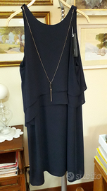 Due vestiti: nero elegante e bianco lino