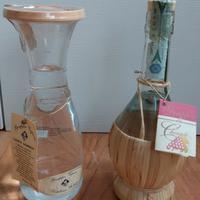 2 vecchie bottiglie di grappa