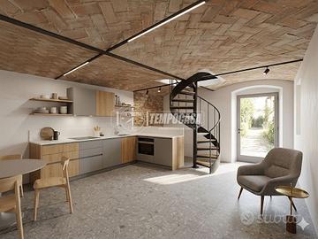 DEPOSITO SU DUE LIVELLI CON 14.000 MQ DI TERRENO