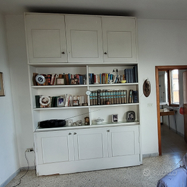 Libreria con letto a scomparsa anni '60 su misura