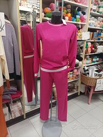 Tuta fucsia marca oro blu