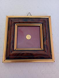 riproduzione moneta d'oro più piccola del mondo 