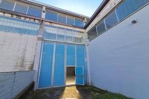 Magazzino con Uffici e Area Cortilizia