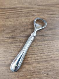 Apri bottiglia vintage in metallo. 