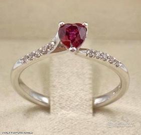 ANELLO ORO 18kt. CON DIAMANTI E RUBINO CUORE