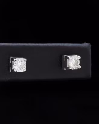 ORECCHINI PUNTO LUCE ORO 18KT CON BRILLANTI 0.34CT
