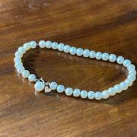 Bracciale perle e oro comete