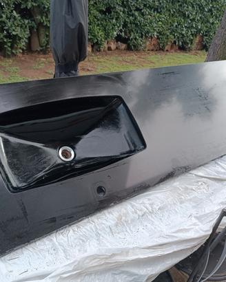 Lavabo con piano in okite nero
