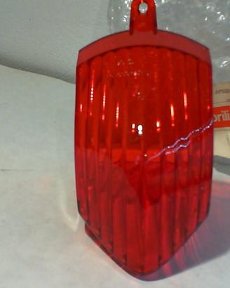 VETRO FANALE POST. SR APRILIA AP8224658