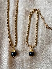 parure acciaio su coccu kokku onice portafortuna