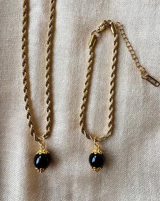 parure acciaio su coccu kokku onice portafortuna