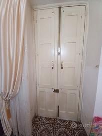 Porta in legno con vetro
