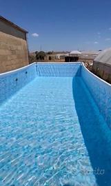Piscina fuori terra 7×3,5 m con motore, robot e sc