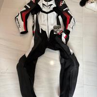 Tuta moto e stivali nuovi