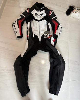 Tuta moto e stivali nuovi