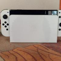 nintendo switch oled bianca + accessori e giochi
