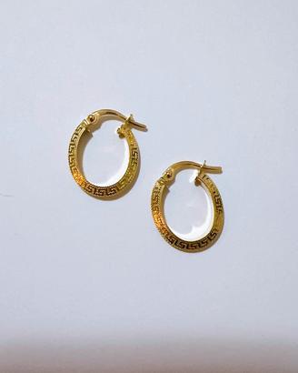 Orecchini ovali con greche in oro giallo 18kt 750