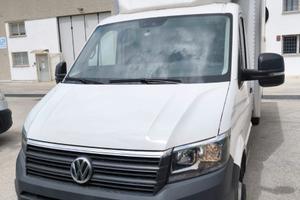 Autocarro con sponda caricatrice