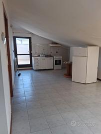 Bilocale con terrazzo solarium