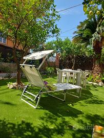 Appartamento con tre camere e giardino