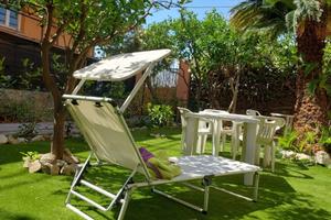 Appartamento con tre camere e giardino