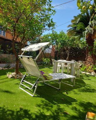 Appartamento con tre camere e giardino
