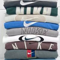 vestiti uomo pantaloni maglioni felpe Stock