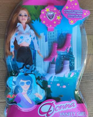 bambola per bambina con accessori moda.