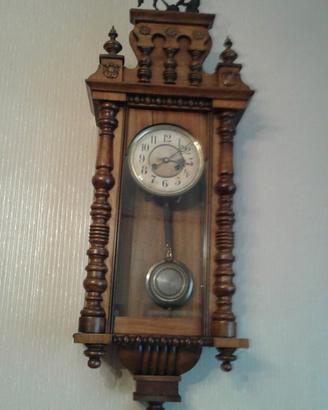 orologio pendolo da muro