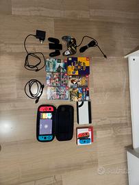 Nintendo Switch OLED + 6 giochi + joystick esterno
