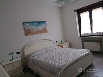 Appartamento con giardino vicino al mare