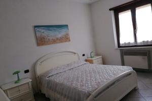 Appartamento con giardino vicino al mare