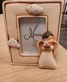 Cornice portafoto con angioletto