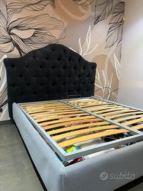 Letto con box contenitore e testiera capitonnè