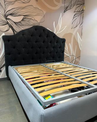 Letto con box contenitore e testiera capitonnè