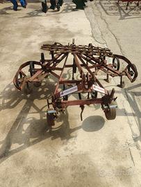 Vibrocult regolabile