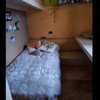 camera con letti singoli scorrevoli e ponte