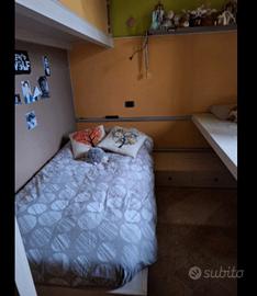 camera con letti singoli scorrevoli e ponte