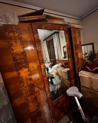 Camera da letto in radica di noce
