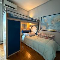 letto a castello con struttura a elle